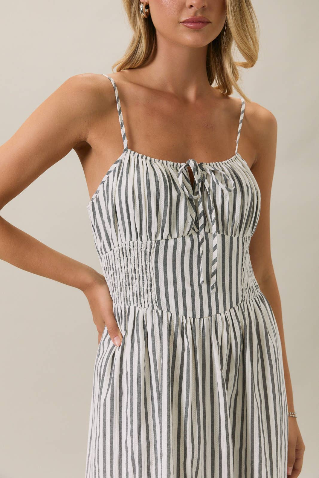 SLEEVELESS SMOCKED MIDI DRESS WITH KEYHOLE & BOTTOM RUFFLE