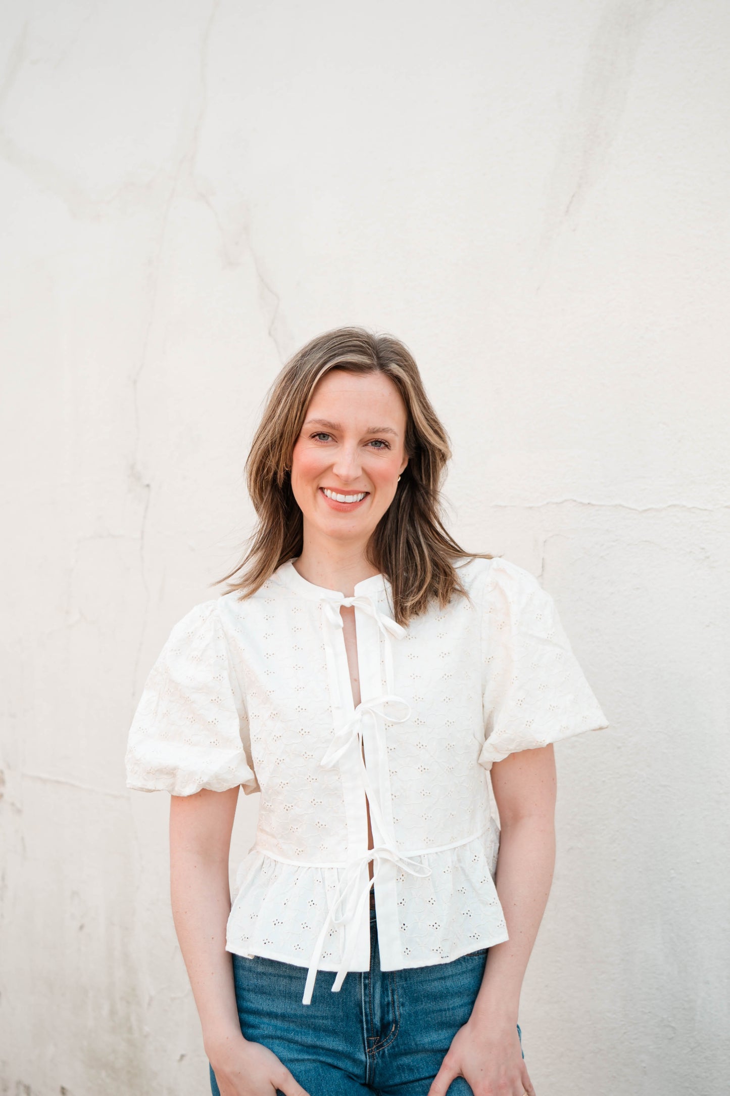 Eyelet Tie Front Peplum Top